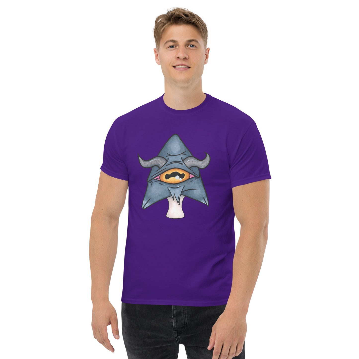 male model wears purple mens tee featuring a trippy grey goat mushroom design with one yellow eye