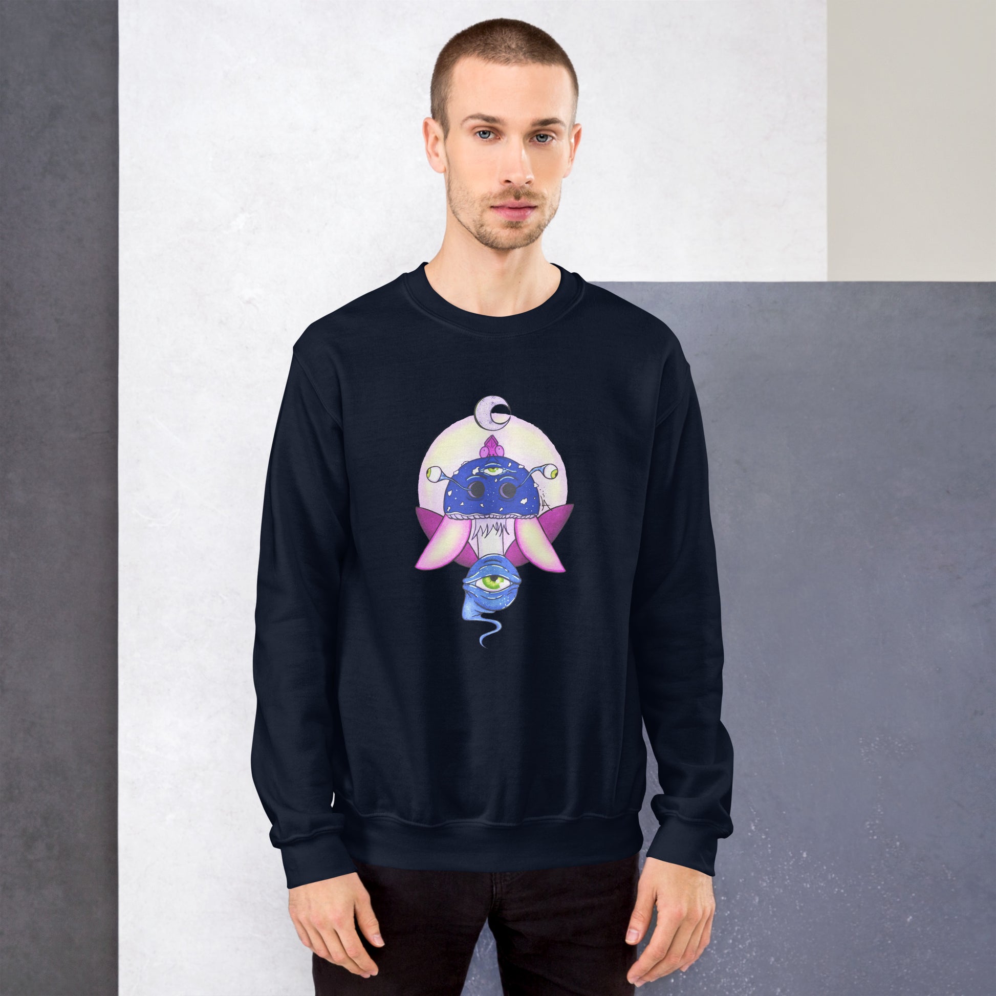 male model wears Unisex navy crew neck sweatshirt with mystical print featuring a multi-eyed mushroom, insect wings, and a watchful eye.