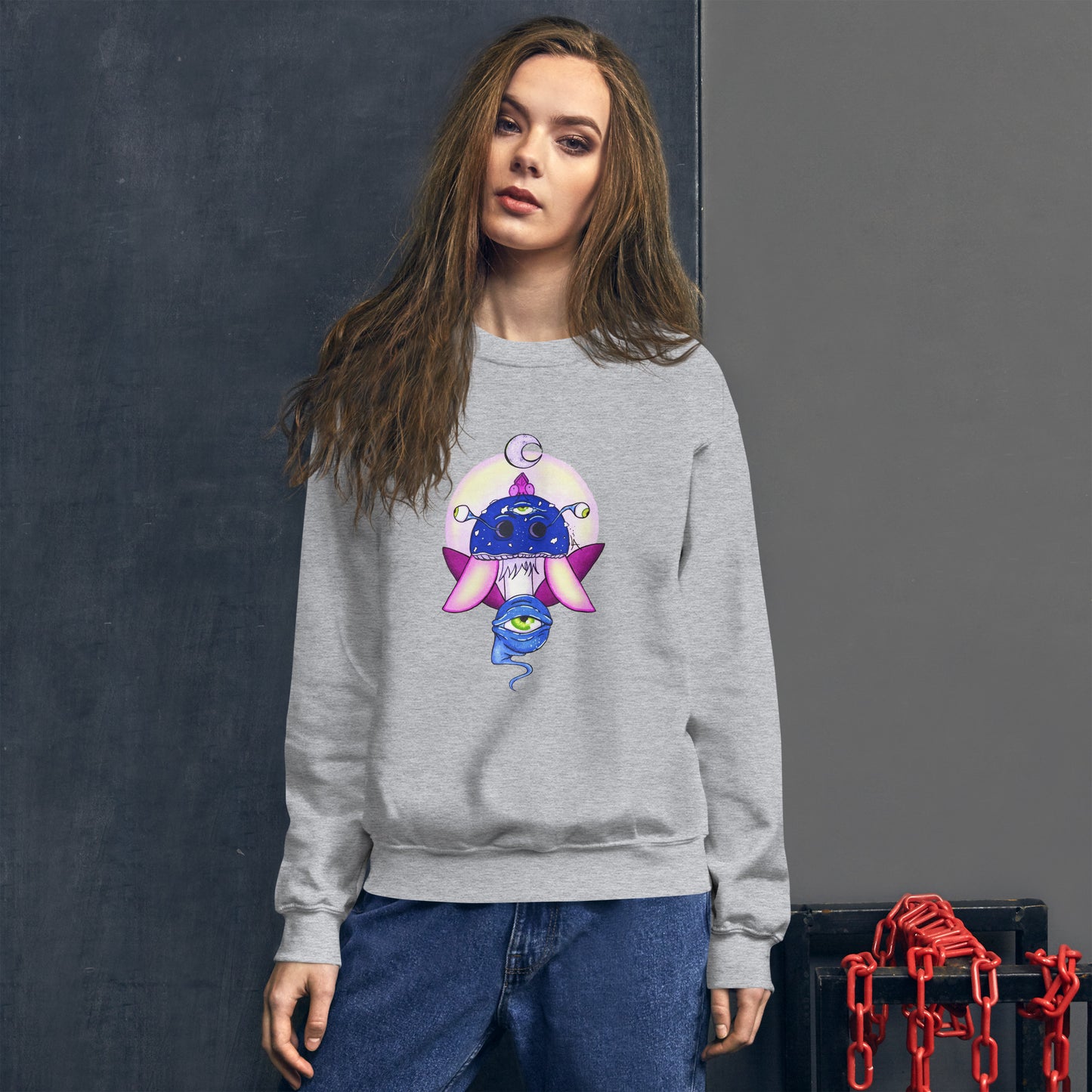 female model wears Unisex sport grey crew neck sweatshirt with mystical print featuring a multi-eyed mushroom, insect wings, and a watchful eye.