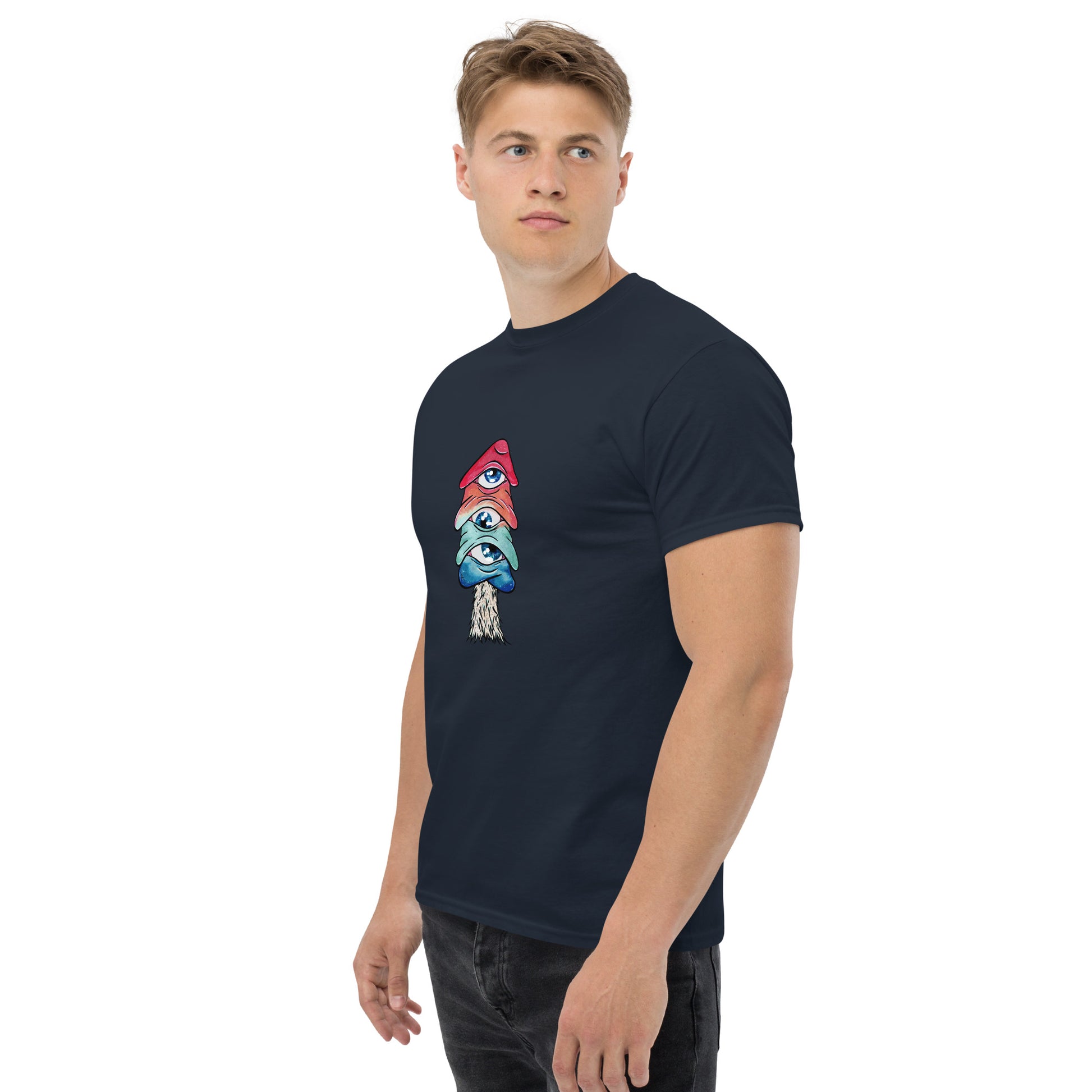 male model wears Navy crew neck tshirt mushroom with 3 eyes in pink green and blue side view