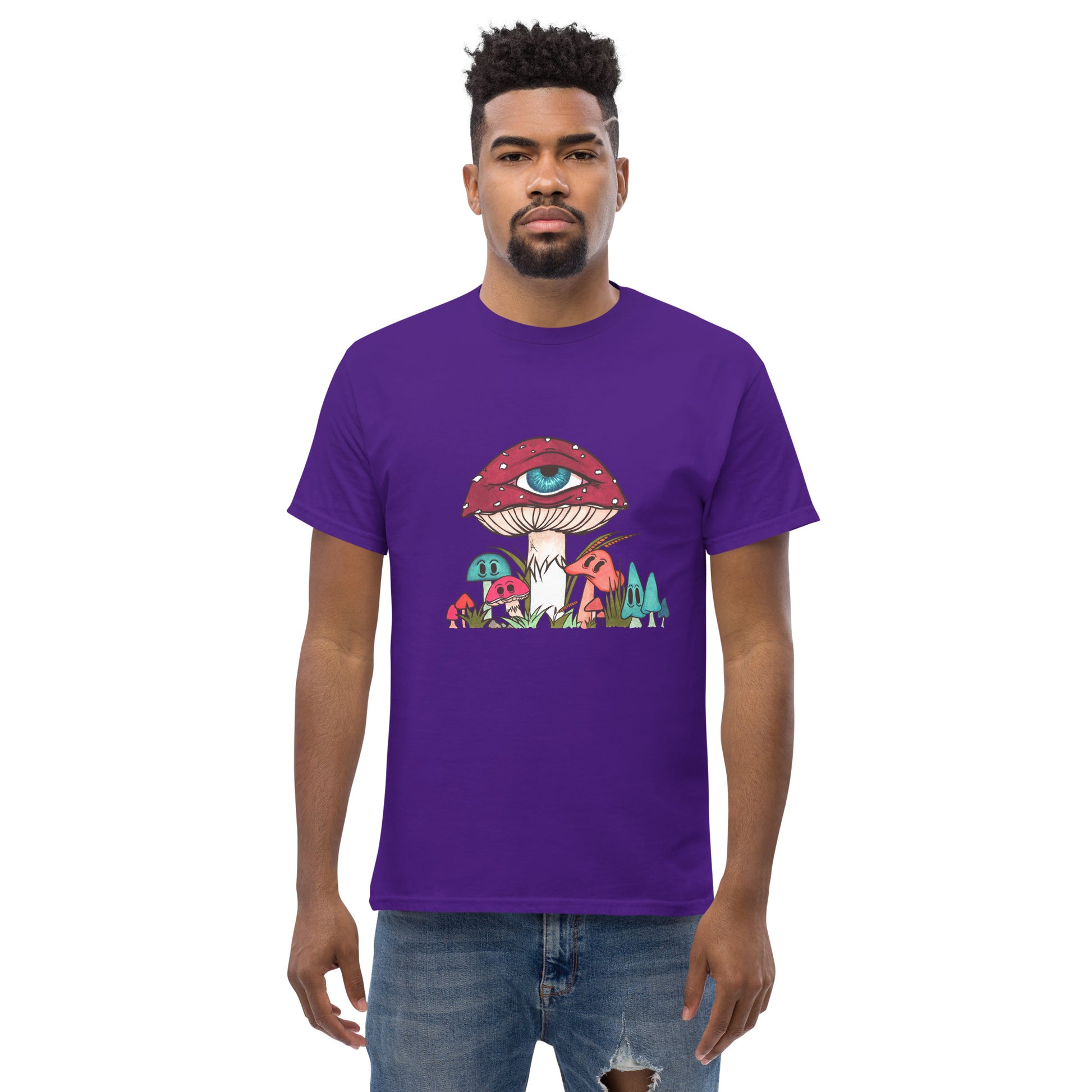 male wears purple tshirt red and white toadstool mushroom with all seeing eye smaller surrounding blue orange and red mushrooms