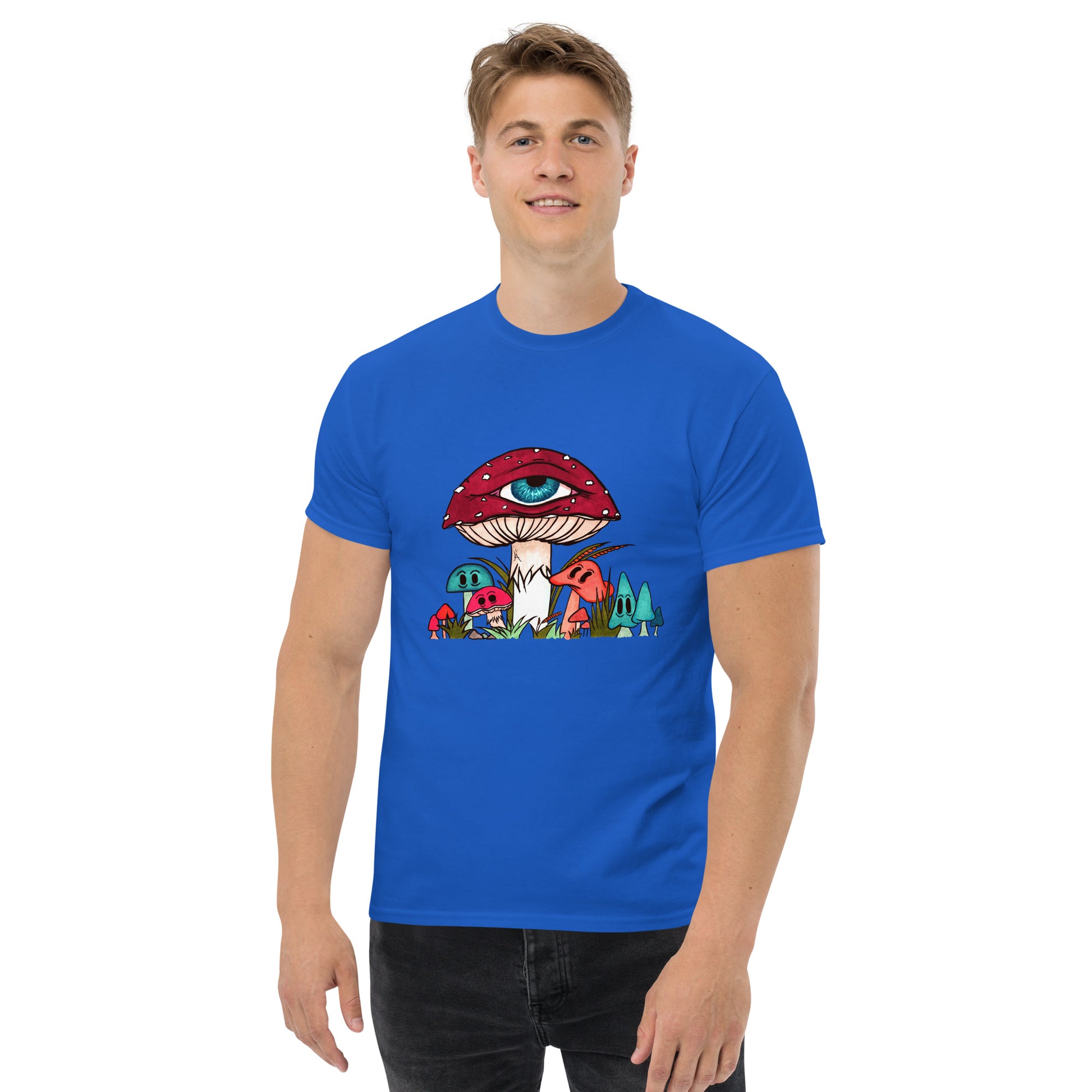 male wears royal blue tshirt red and white toadstool mushroom with all seeing eye smaller surrounding blue orange and red mushrooms