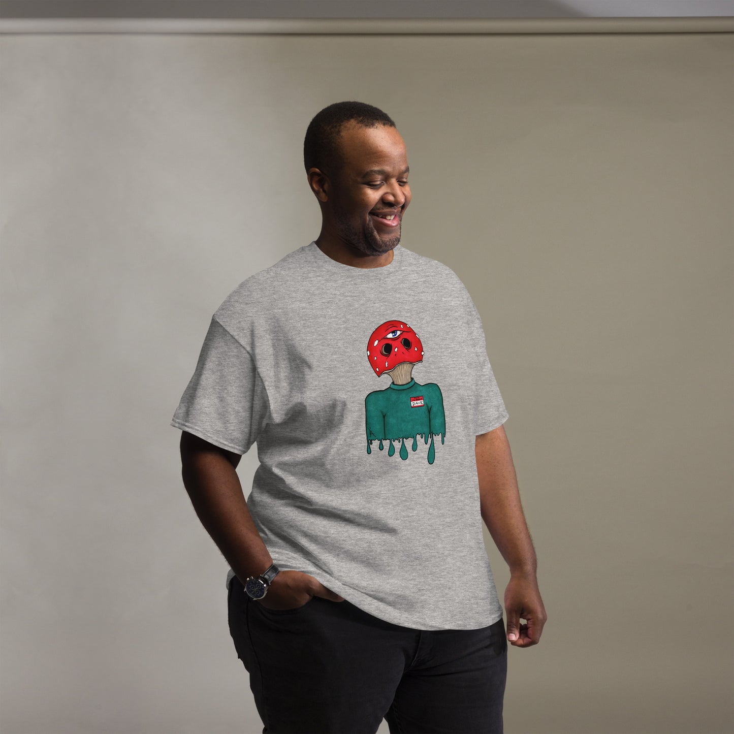 male wears trippy toadstool mushroom man named Dave printed on a Sport grey crew neck t-shirt