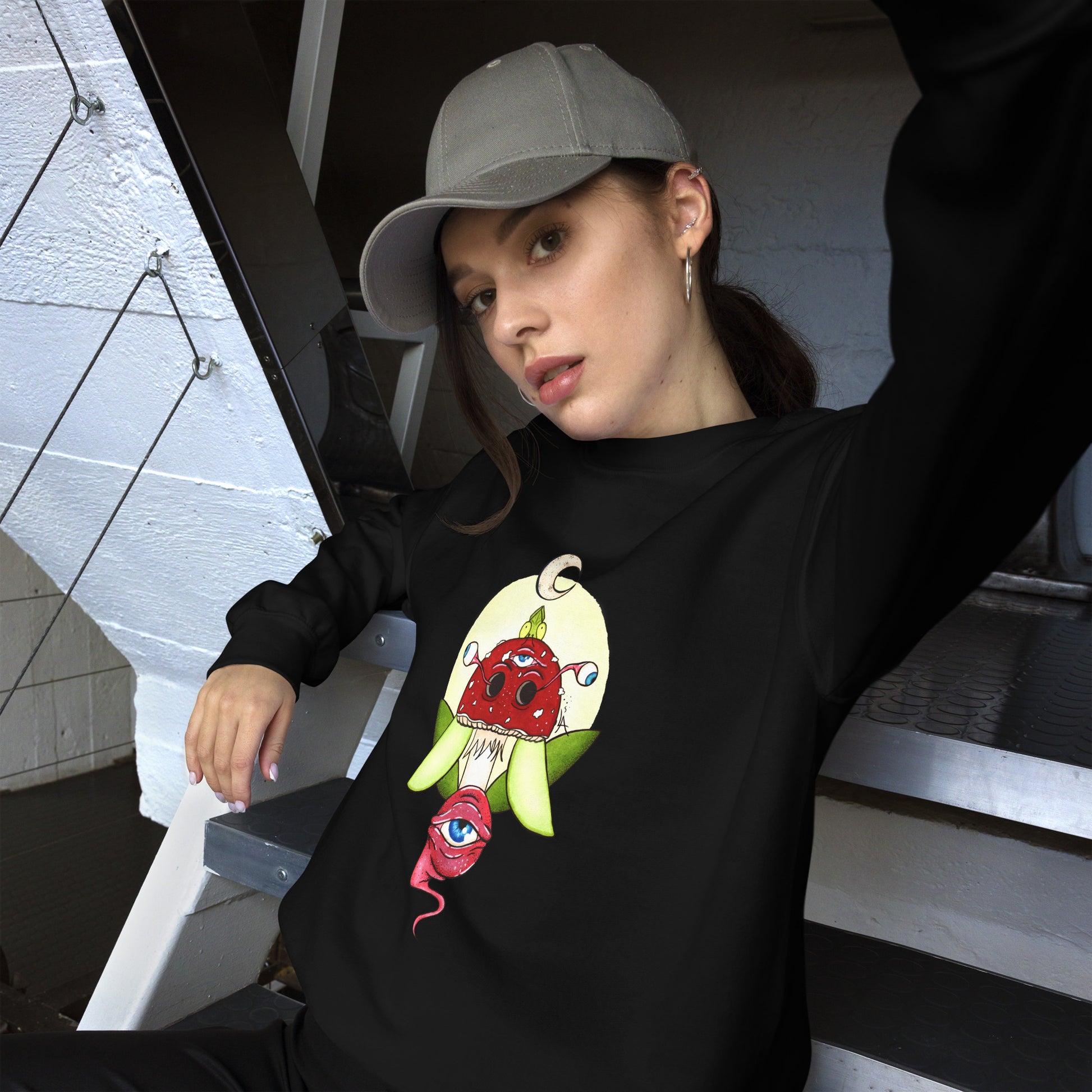 female model black unisex crew neck sweatshirt psychedelic toadstool mushroom with eyes full moon crescent moon flying insect