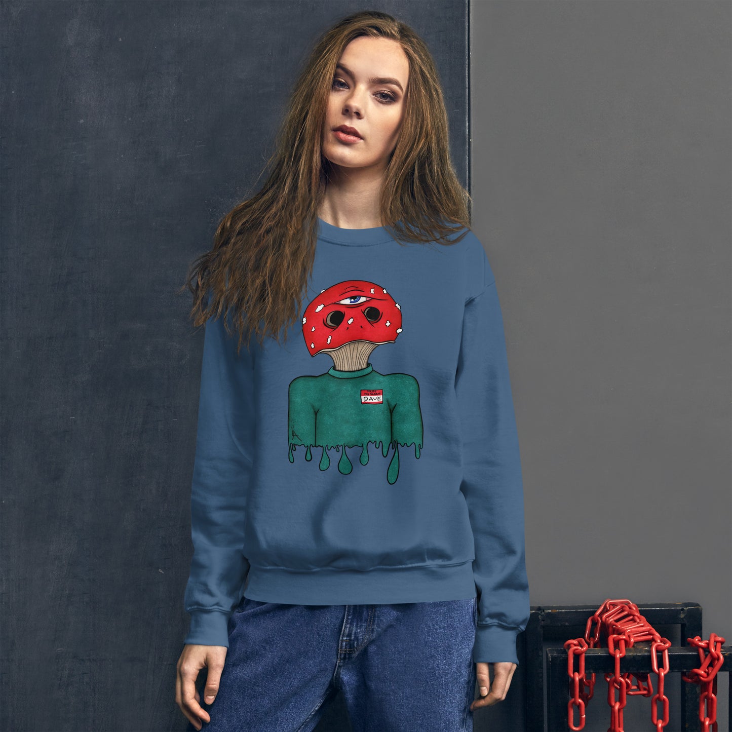 female wears trippy toadstool mushroom man named Dave printed on a indigo blue unisex sweatshirt 