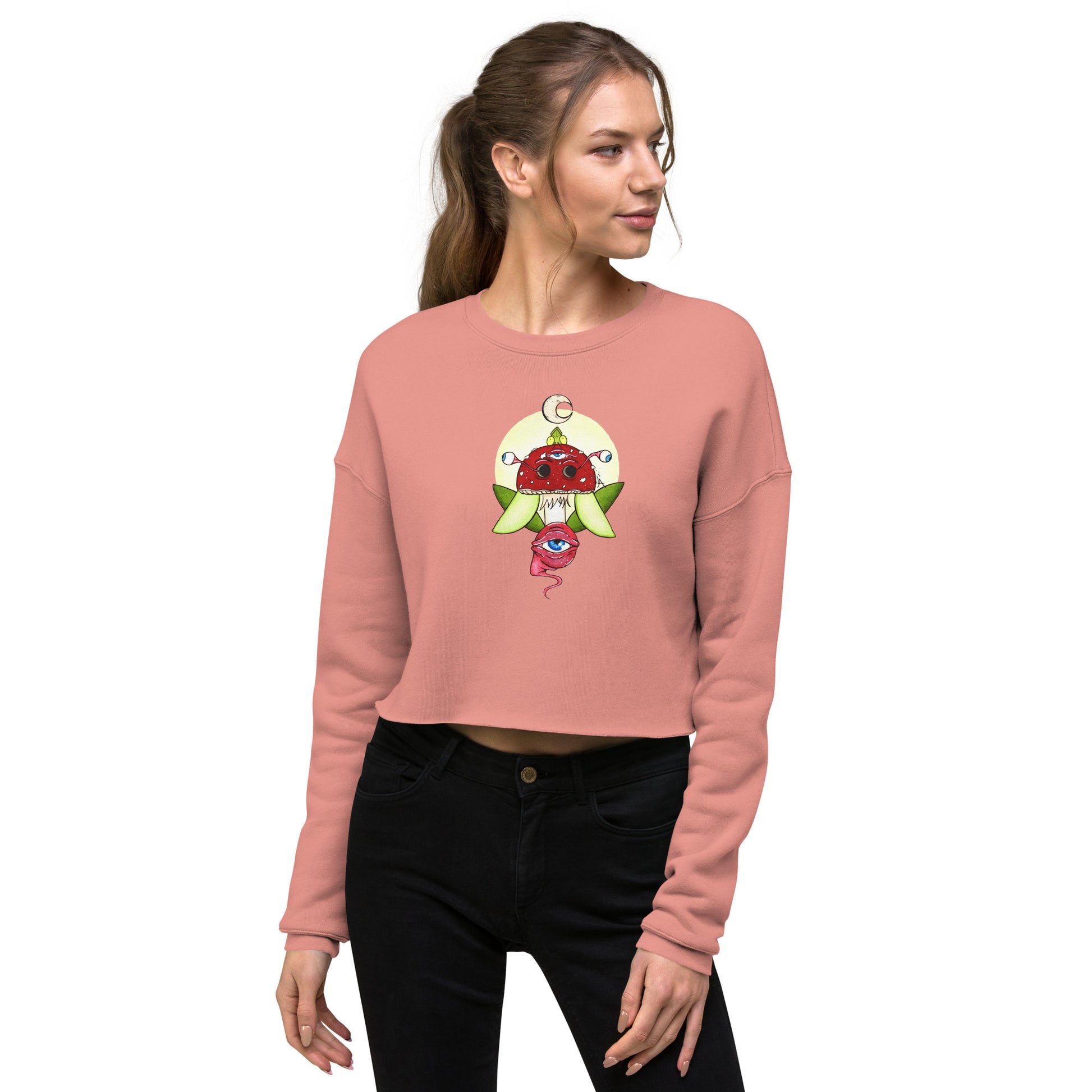 female model front wears mauve crop sweatshirt psychedelic toadstool mushroom with eyes full moon crescent moon flying insect